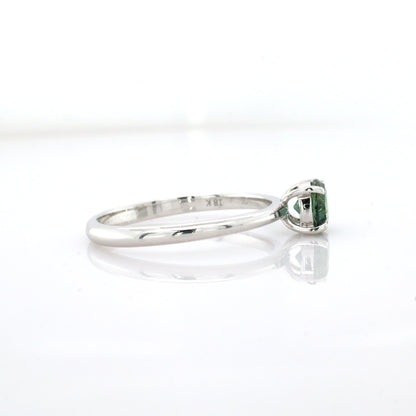 Teal sapphire and diamond ring in 18K white gold