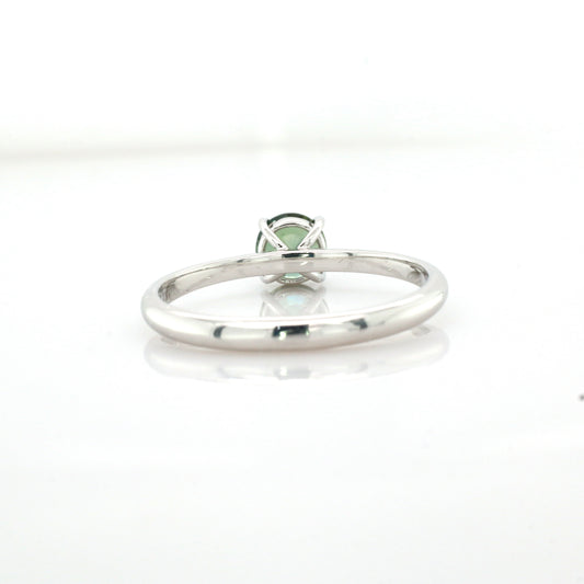 Teal sapphire and diamond ring in 18K white gold
