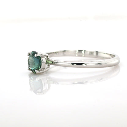 Teal sapphire and diamond ring in 18K white gold