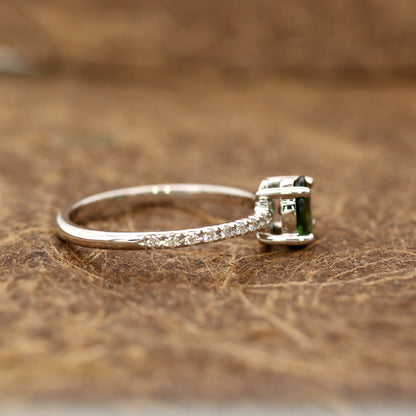 Teal sapphire and diamond ring in 18K white gold