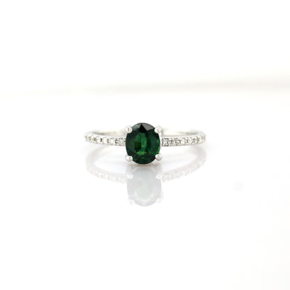 Teal sapphire and diamond ring in 18K white gold