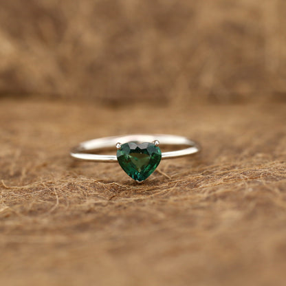 Teal sapphire and diamond ring in 18K white gold