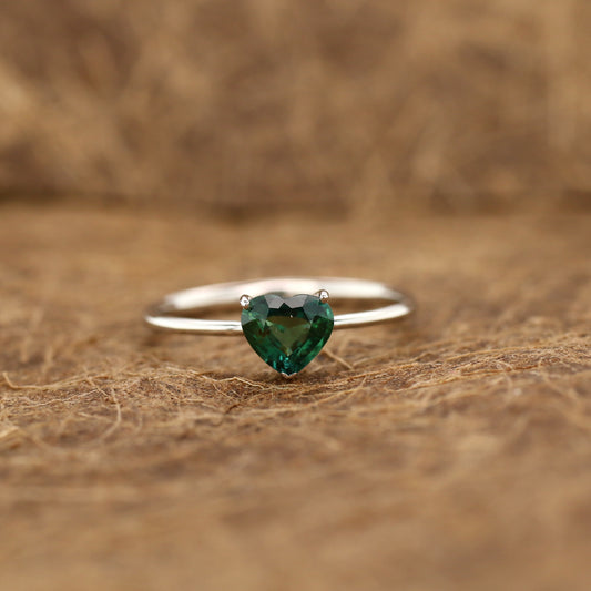Teal sapphire and diamond ring in 18K white gold