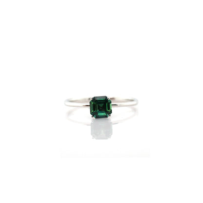 Teal sapphire and diamond ring in 18K white gold