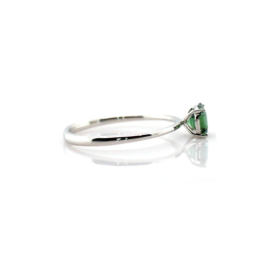 Teal sapphire and diamond ring in 18K white gold