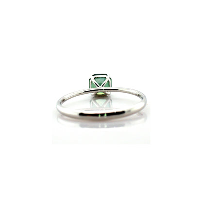 Teal sapphire and diamond ring in 18K white gold