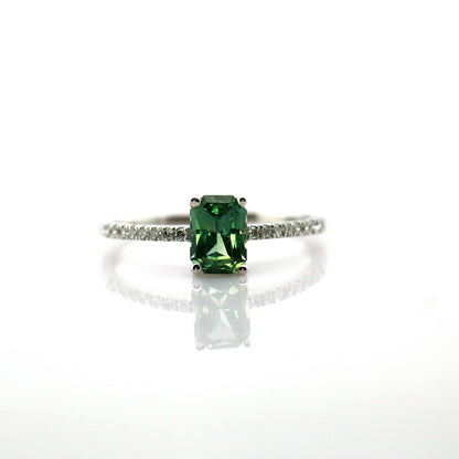 Teal sapphire and diamond ring in 18K white gold
