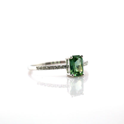 Teal sapphire and diamond ring in 18K white gold