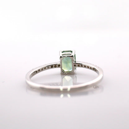 Teal sapphire and diamond ring in 18K white gold