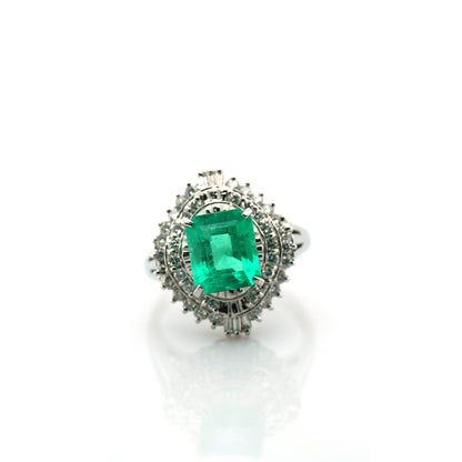 diamond and emerald ring in 950 platinum