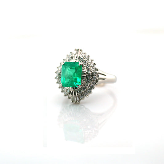 diamond and emerald ring in 950 platinum