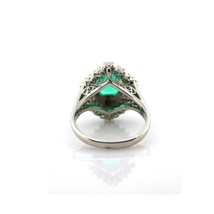 diamond and emerald ring in 950 platinum