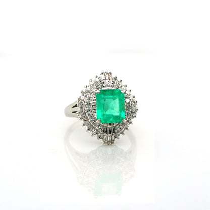 diamond and emerald ring in 950 platinum
