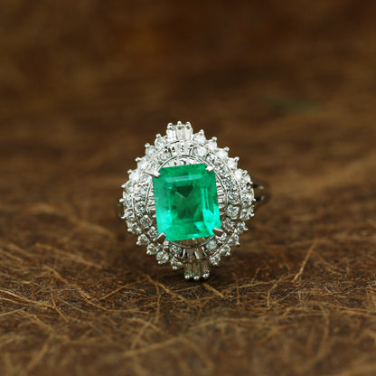 diamond and emerald ring in 950 platinum
