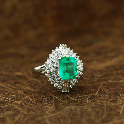 diamond and emerald ring in 950 platinum