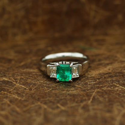 diamond and emerald ring in 950 platinum