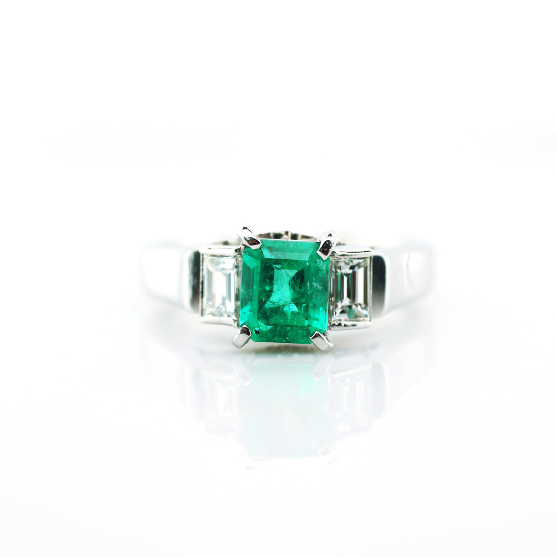 diamond and emerald ring in 950 platinum