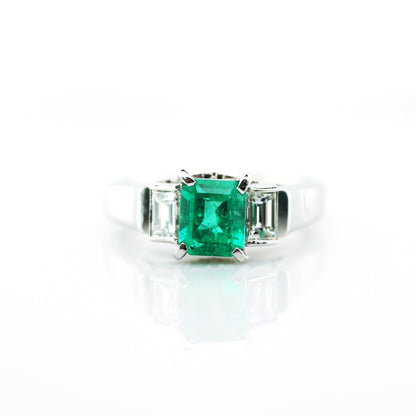 diamond and emerald ring in 950 platinum