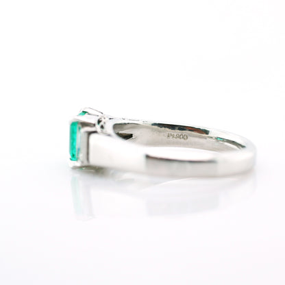 diamond and emerald ring in 950 platinum