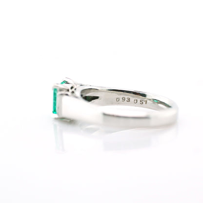 diamond and emerald ring in 950 platinum