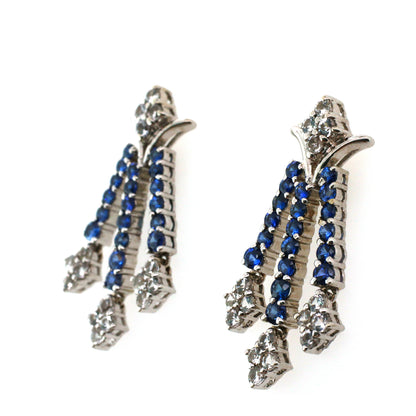 White sapphire and Blue sapphire earrings in 18K white gold