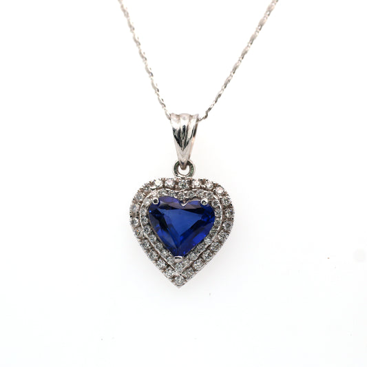 Stunning Heart Pendant Elaborated with Blue Sapphire Beauty is enhanced by addition of White Diamond