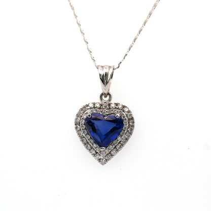 Blue sapphire and diamond pendant