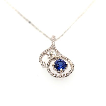 Blue sapphire and diamond pendant in 18K white gold