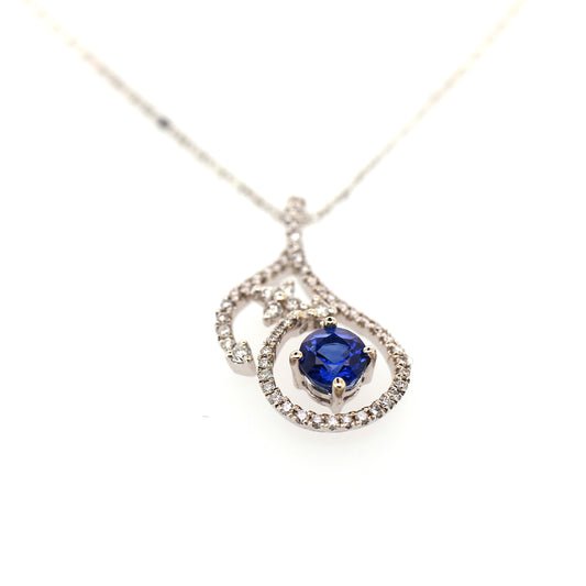 Blue sapphire and diamond pendant in 18K white gold
