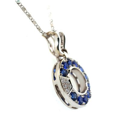 Blue sapphire and diamond pendant in 18K white gold