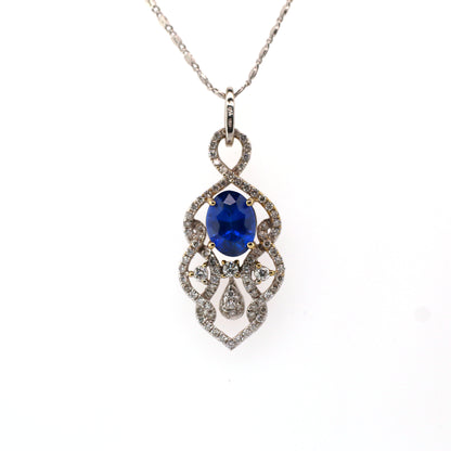 Blue sapphire and diamond pendant in 18K white gold