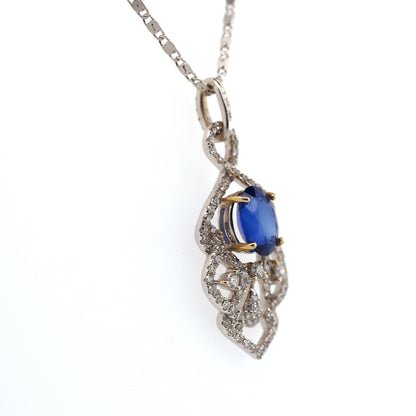 Blue sapphire and diamond pendant in 18K white gold