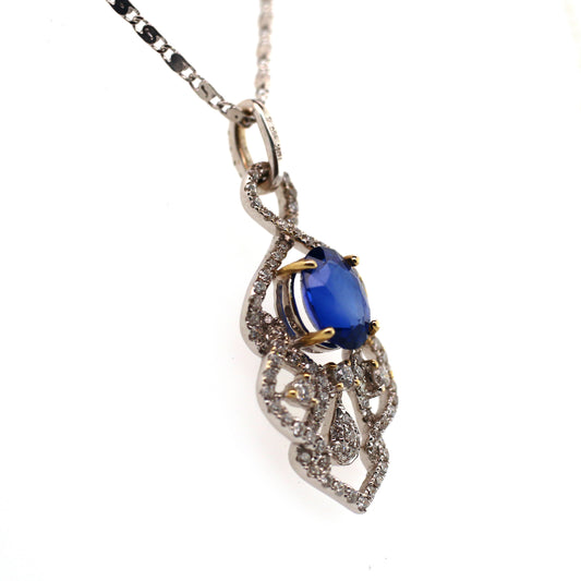 Blue sapphire and diamond pendant in 18K white gold