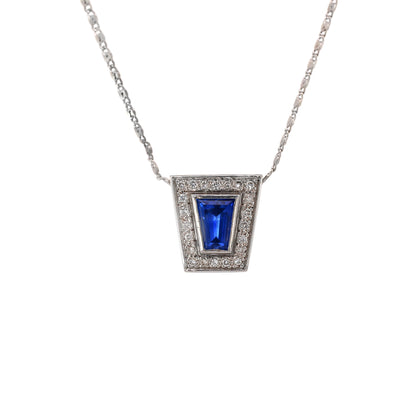 Blue sapphire and diamond pendant in 18K white gold