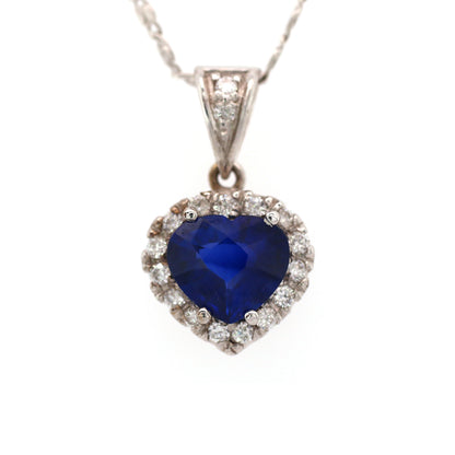 Blue sapphire and diamond pendant in 18K white gold