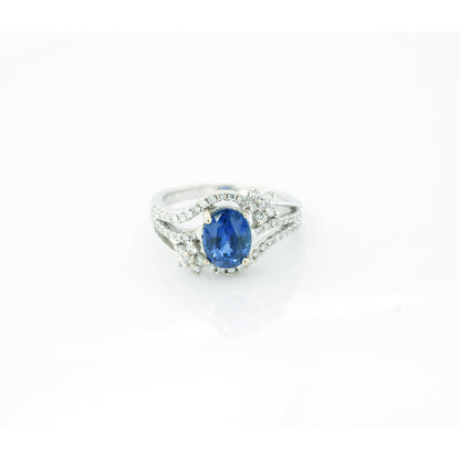 Blue sapphire and diamond cocktail stud ring in 18K white gold