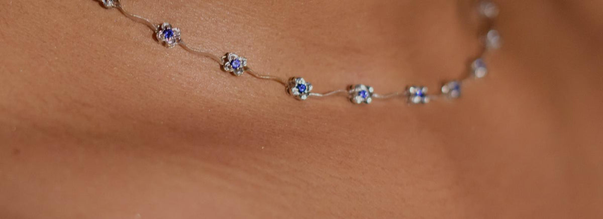 Blue gemstone necklace, worn