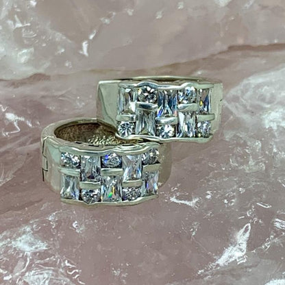 cubic zirconia huggie earrings in silver