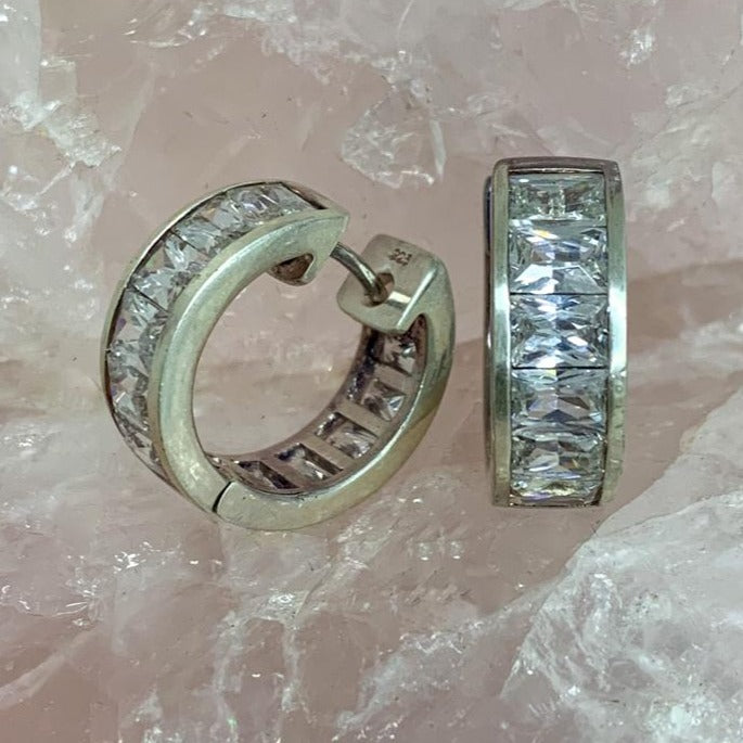 cubic zirconia huggie earrings in silver