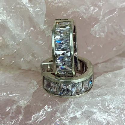 cubic zirconia huggie earrings in silver
