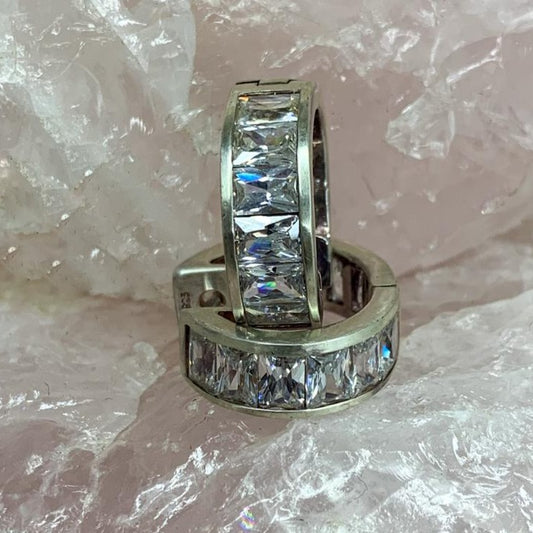 cubic zirconia huggie earrings in silver