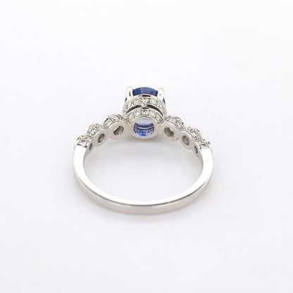 Blue sapphire and diamond ring in 18K white gold