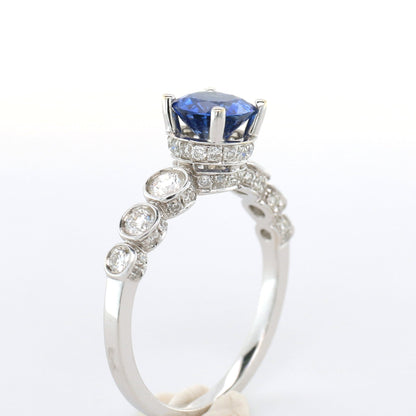 Blue sapphire and diamond ring in 18K white gold