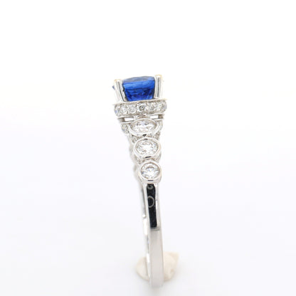 Blue sapphire and diamond ring in 18K white gold