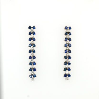 White sapphire and Blue sapphire earrings in 18K white gold