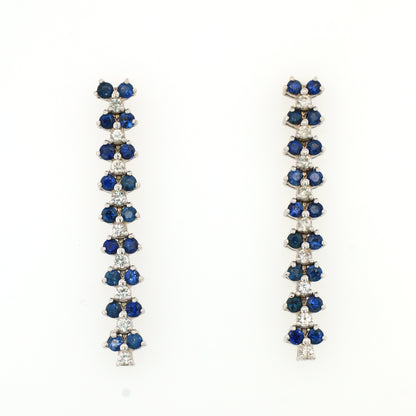 White sapphire and Blue sapphire earrings in 18K white gold