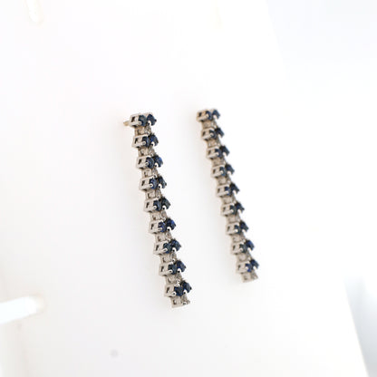 White sapphire and Blue sapphire earrings in 18K white gold