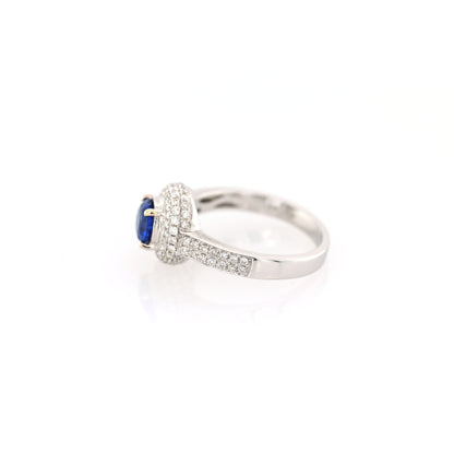 Blue sapphire and diamond ring in 18K white gold