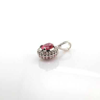 Pink sapphire pendant in 18K white gold