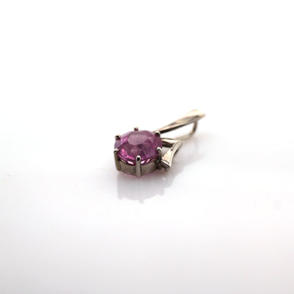 Pink sapphire pendant in 18K white gold